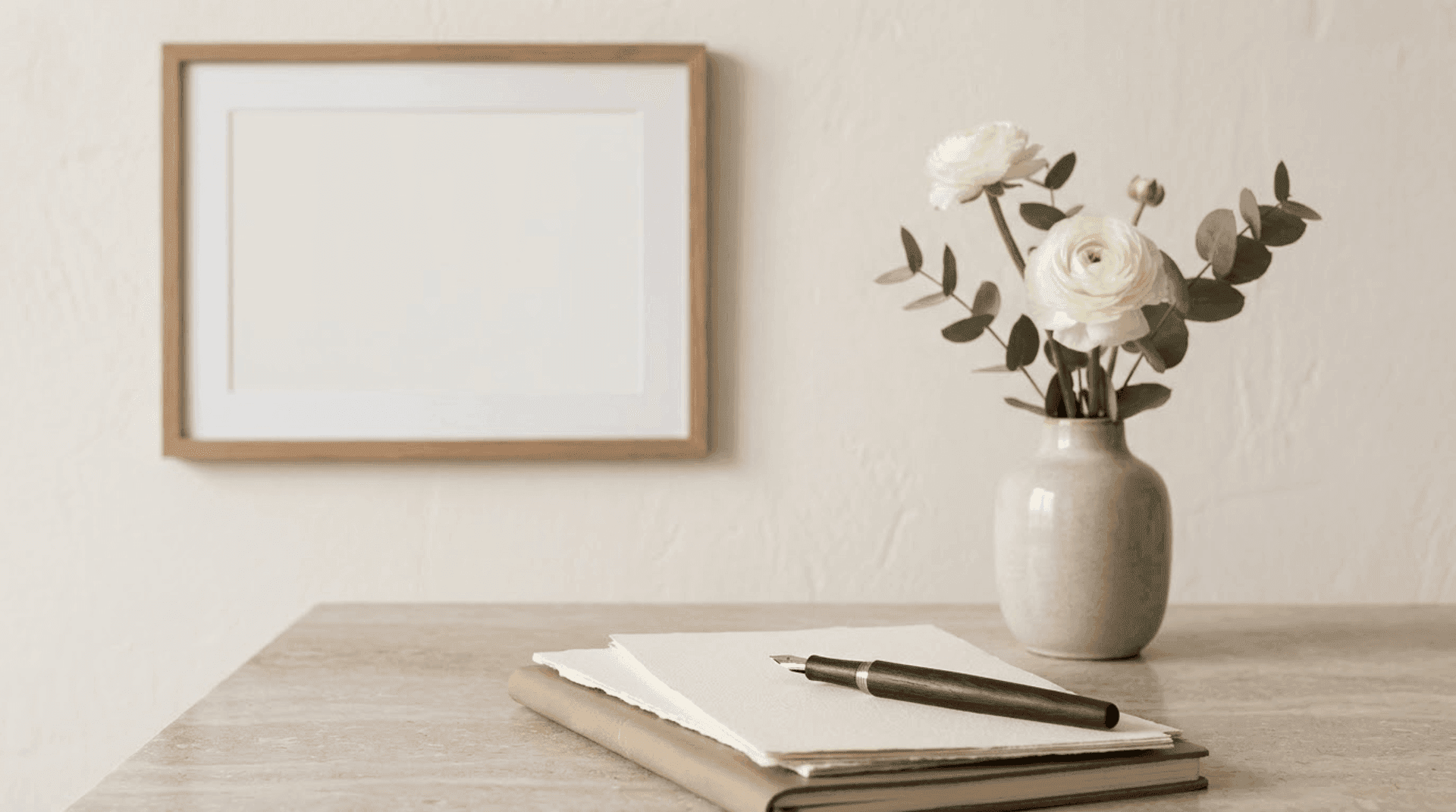 A quiet, light-filled consultation room with two empty chairs and soft natural light
